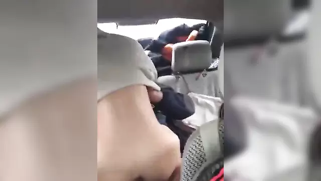 Slim Kyrgyz girl gives a blowjob to her friend in the car